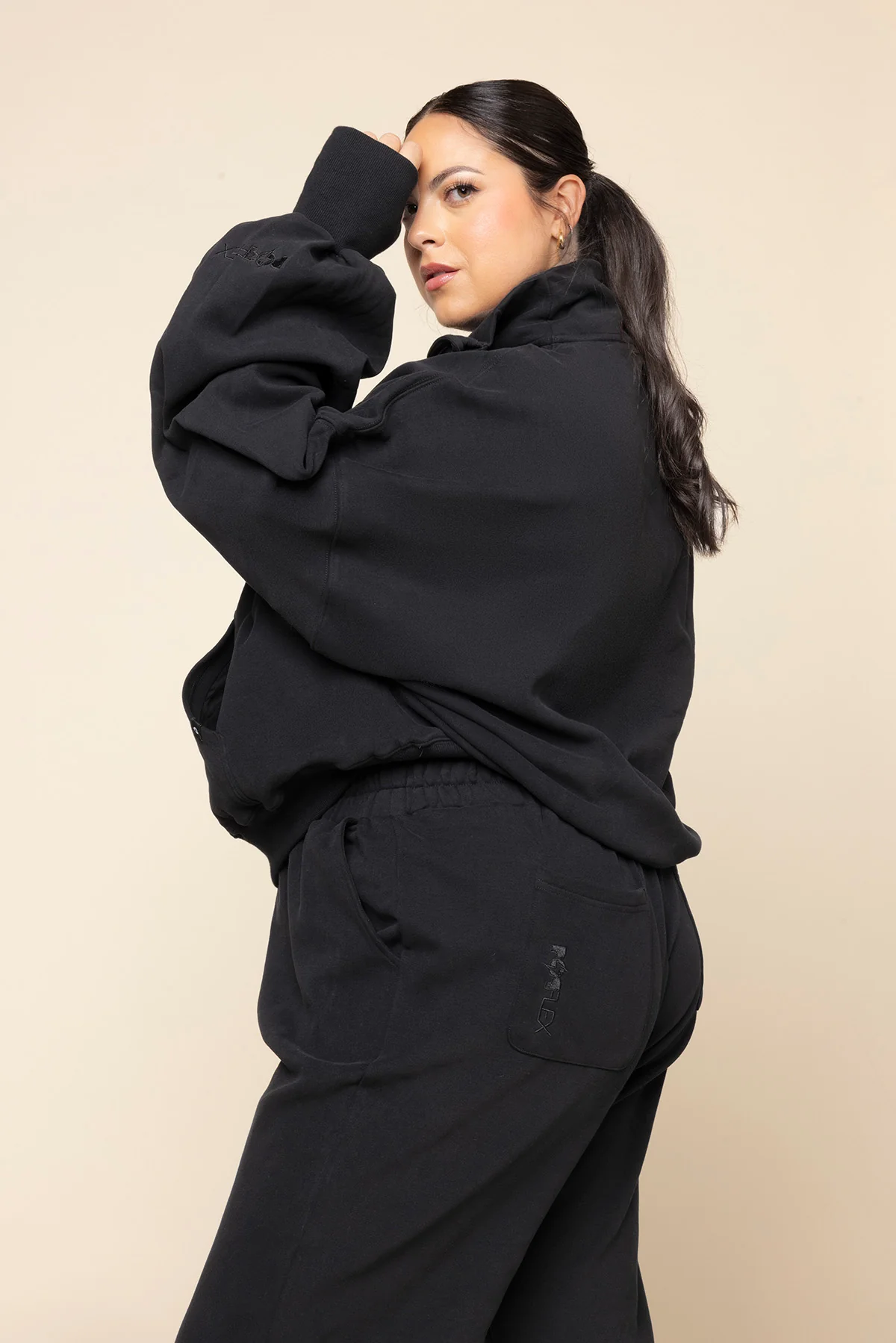 1160-ooey-gooey-half-zip-sweater-black-1.webp