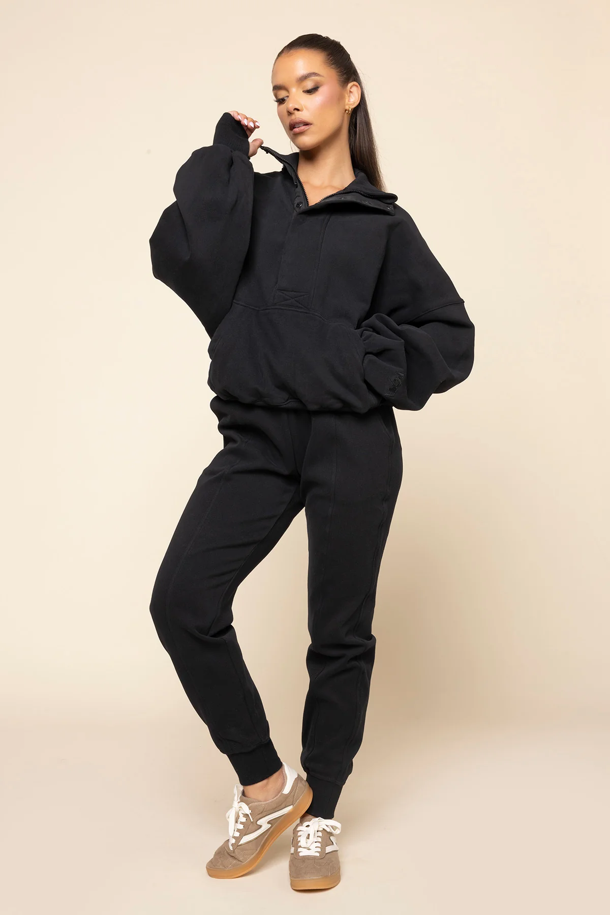 1160-ooey-gooey-half-zip-sweater-black-1.webp