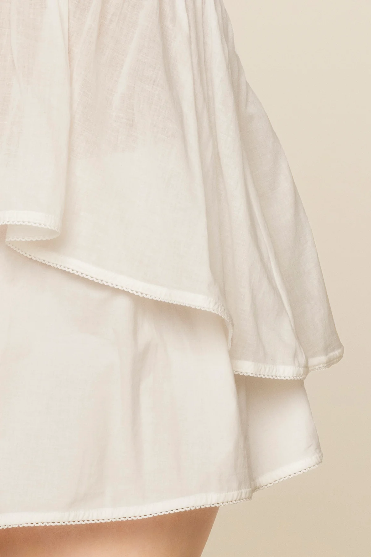 11750-wildest-dreams-babydoll-top-cream-1.webp
