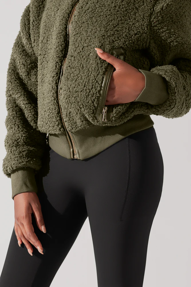 12100-the-kinsley-bomber-jacket-in-faux-sherpa-olive-1.webp