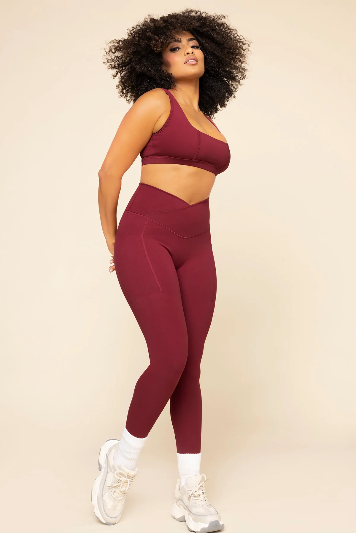 1469-crisscross-hourglass-leggings-with-pockets-crimson-1.webp