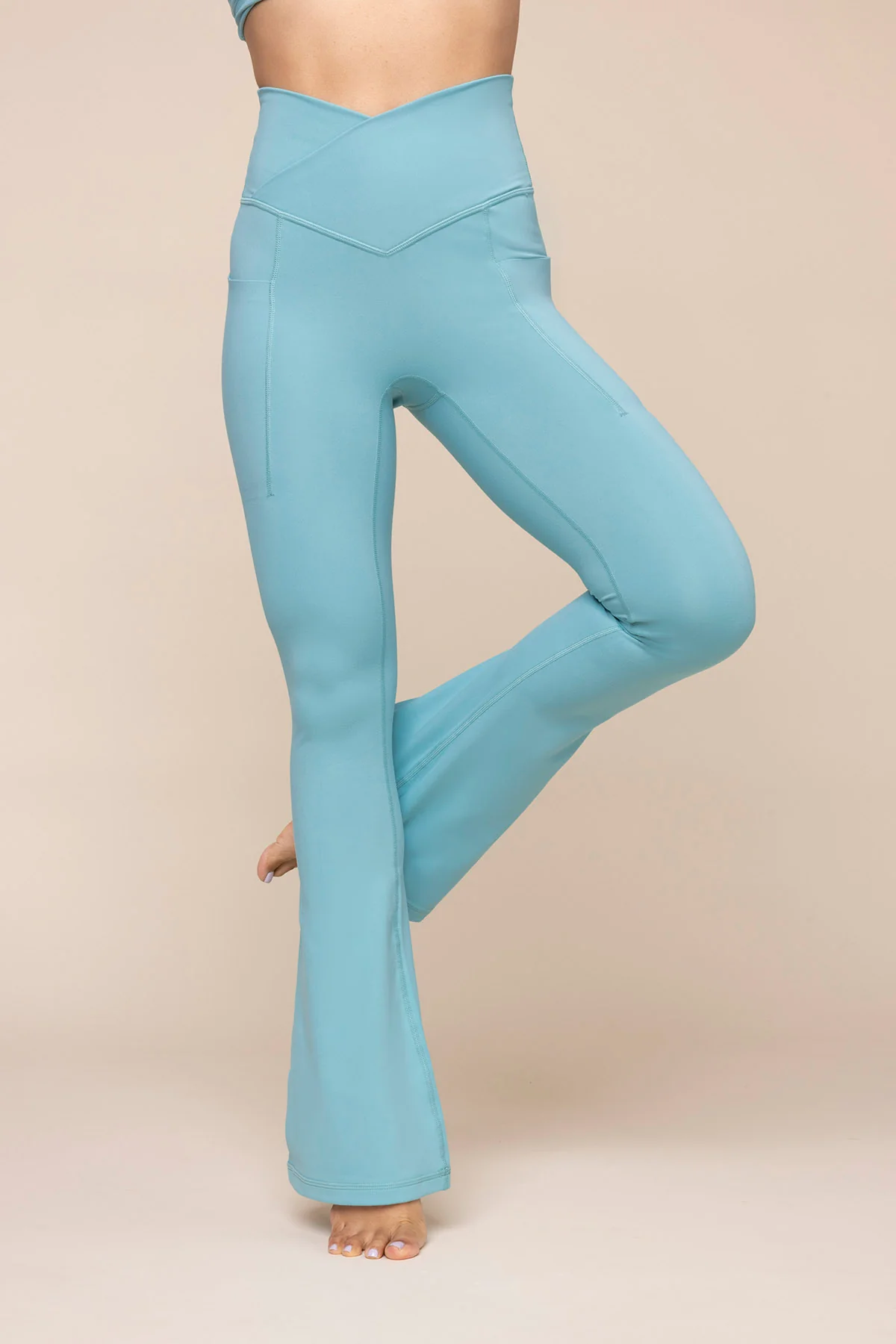 Crisscross HourglassÂ® Flared Leggings with Pockets - Oasis