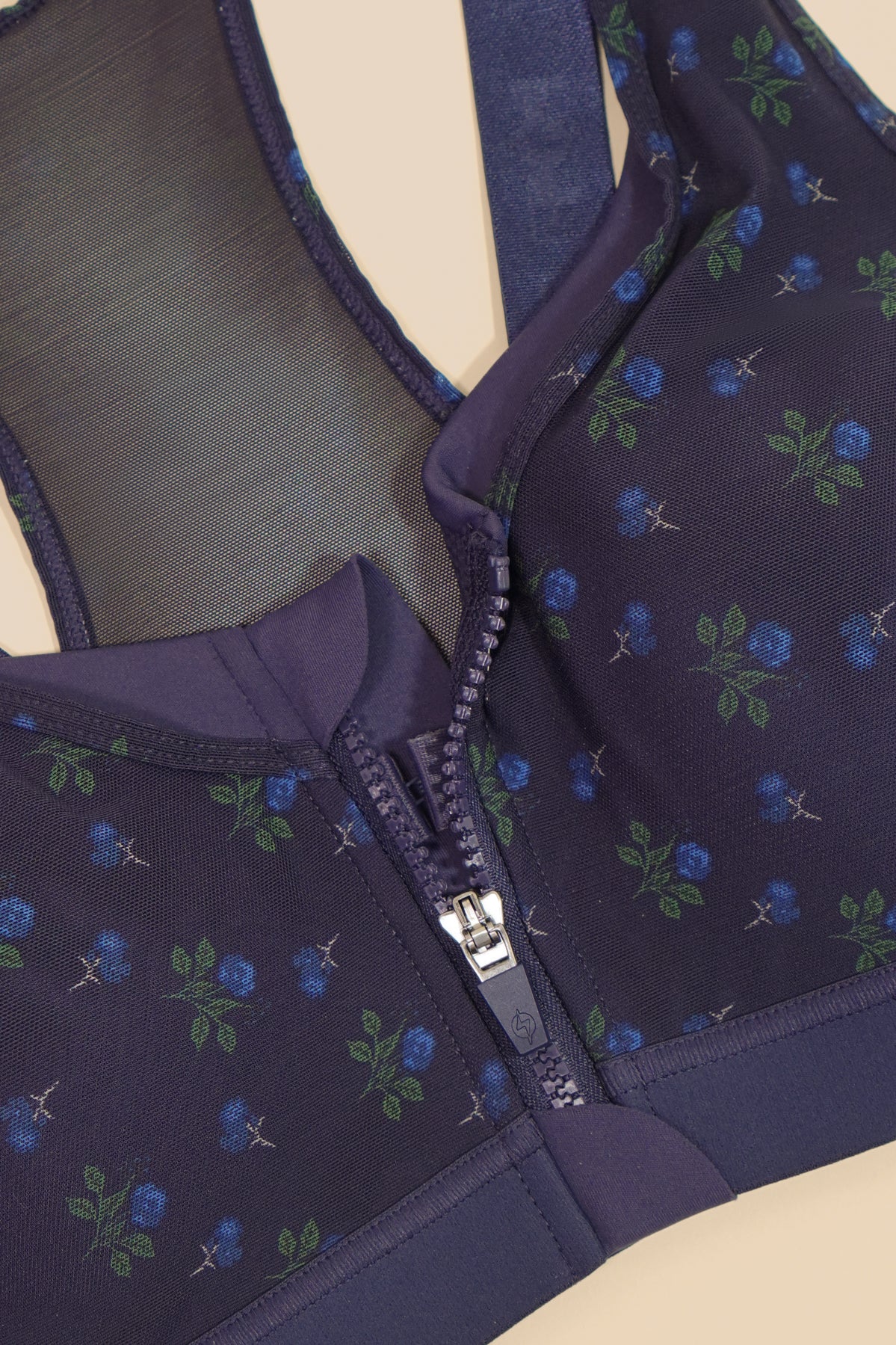 5611-zip-superbra-navy-rosette-1.webp