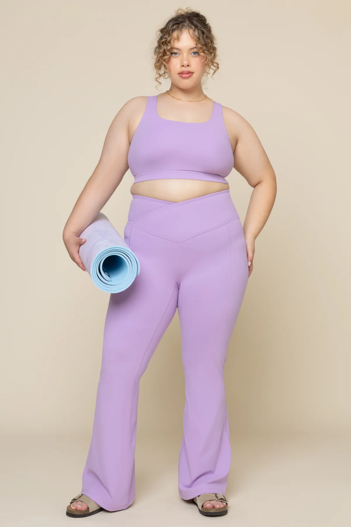 5933-crisscross-hourglass-flared-leggings-with-pockets-mystic-purple-1.webp