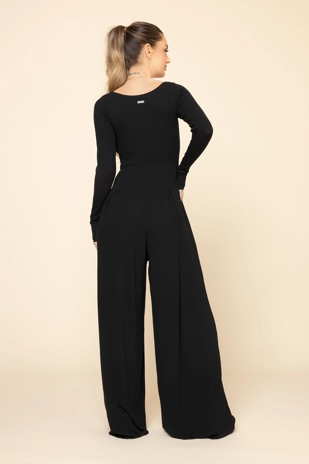 705-go-with-the-flow-long-sleeve-jumpsuit-black-1.webp