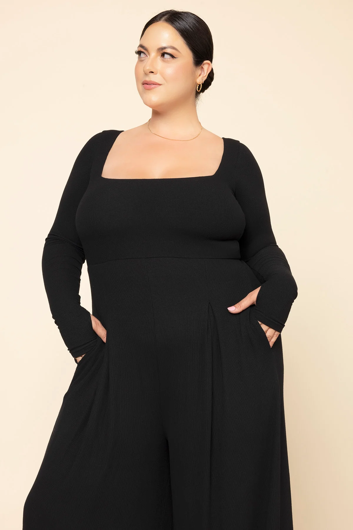 705-go-with-the-flow-long-sleeve-jumpsuit-black-1.webp
