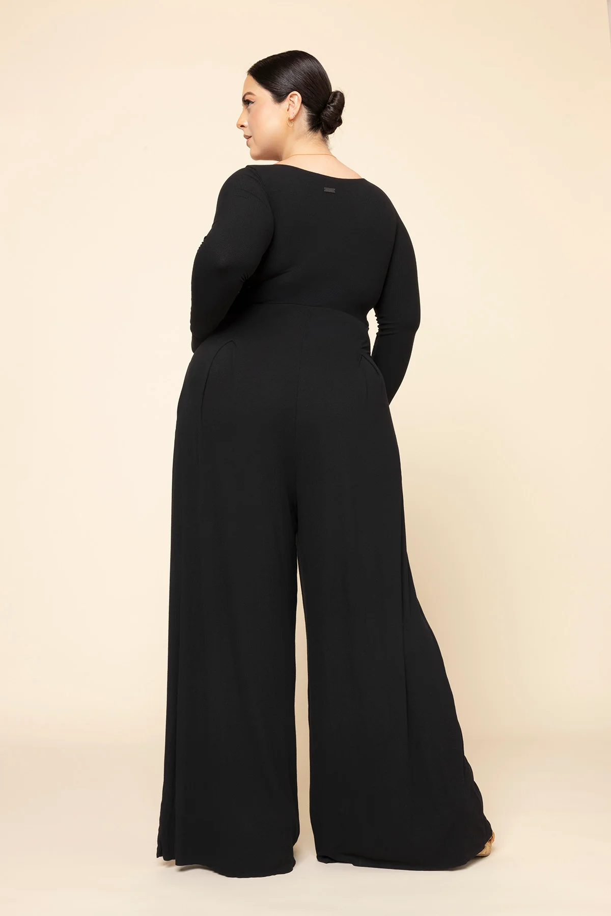 705-go-with-the-flow-long-sleeve-jumpsuit-black-1.webp