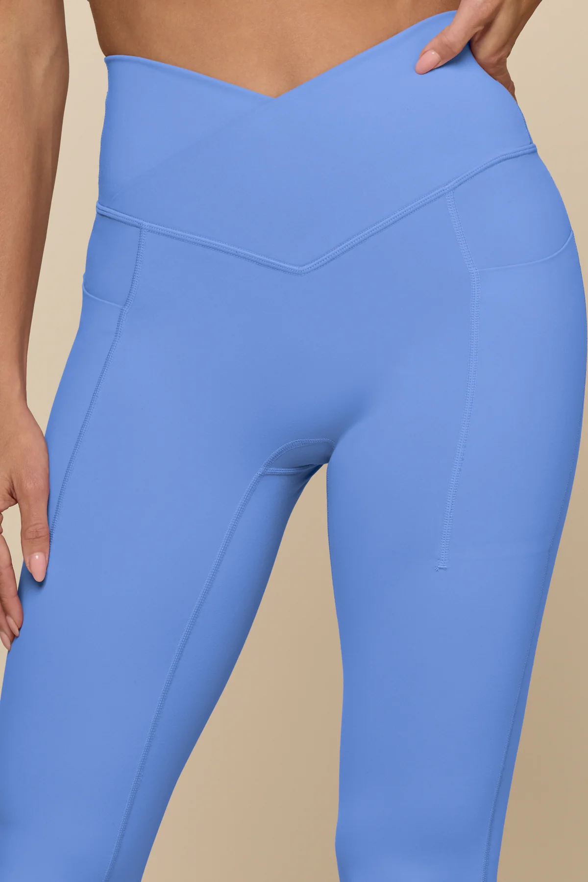 8458-crisscross-hourglass-flared-leggings-with-pockets-nordic-blue-1.webp